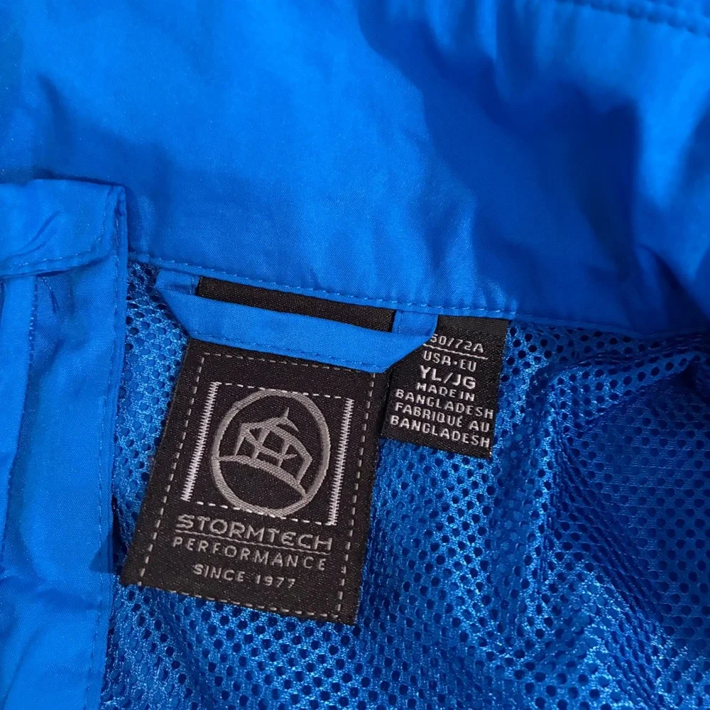 Stormtech Performance Rain Jacket‎ Lightweight Hooded Reflective Blue YL/JG